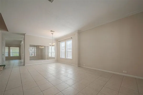 a view of an empty room and window