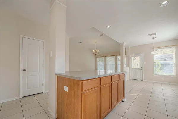 a bathroom with a sink a mirror and a shower
