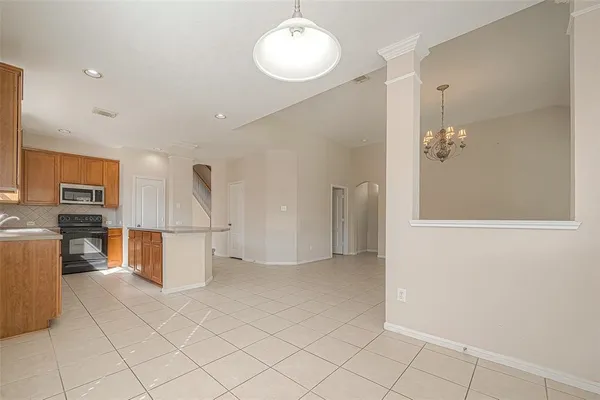 a view of kitchen with furniture and wooden floor