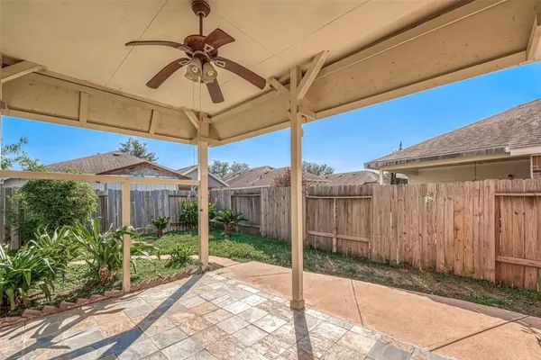 a view of a house with a window and wooden floor