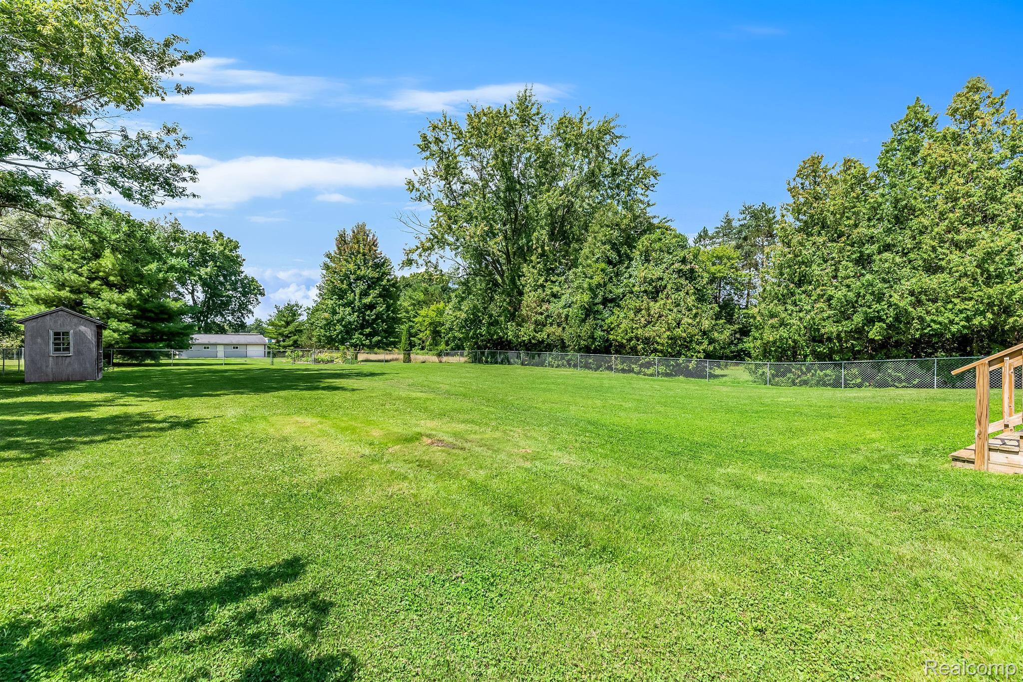 11124 Main Road Fenton, MI 48430 - Photo 26 of 43 Huge yard with fenced in area