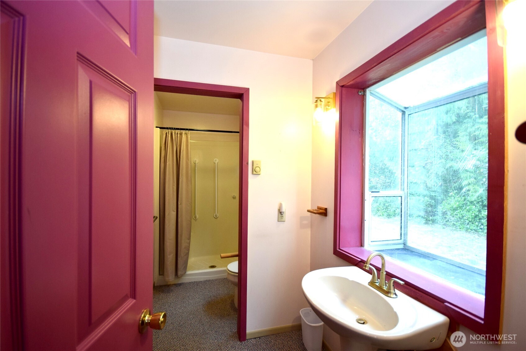 323 Critter Country Trail Sequim, WA 98382 - Photo 22 of 37 a bathroom with a sink a toilet and a mirror