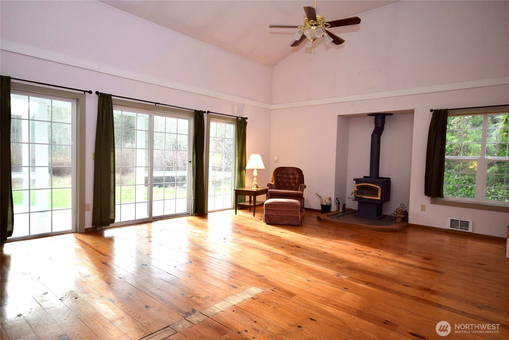 323 Critter Country Trail Sequim, WA 98382 - Photo 7 of 37 a view of a livingroom with furniture a ceiling fan and window