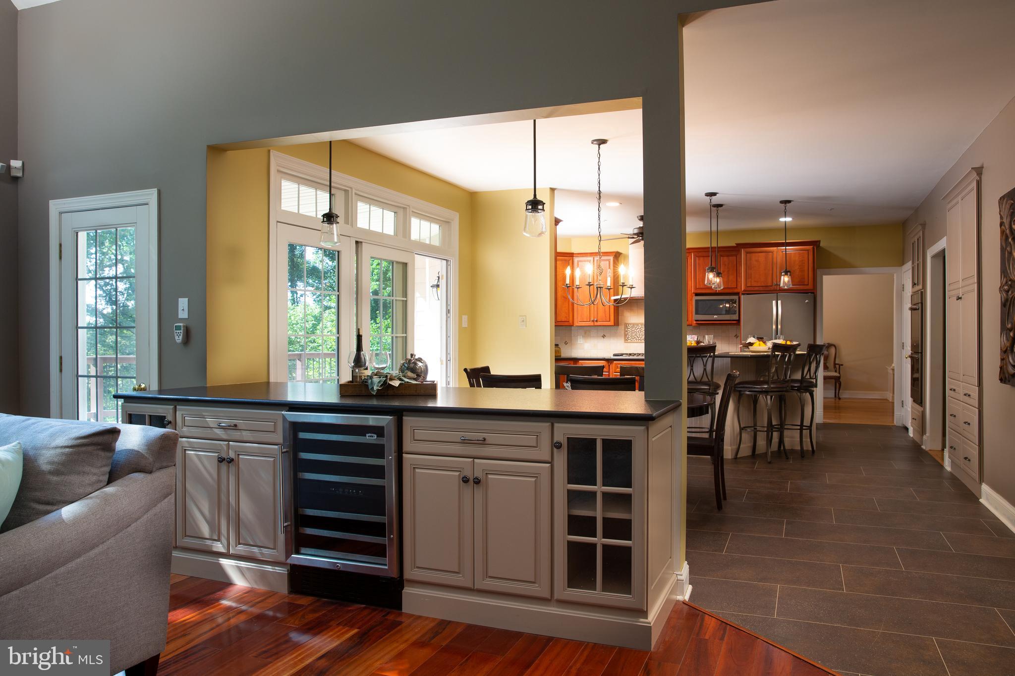 5708 Ridgeview Drive Doylestown, PA 18902 - Photo 12 of 37 Entertaining Peninsula w/Wine Fridge and seating