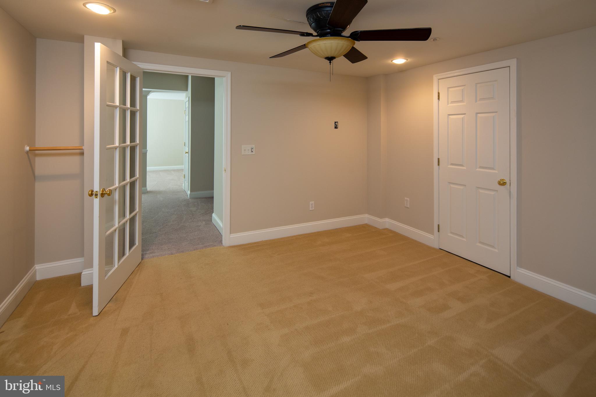 5708 Ridgeview Drive Doylestown, PA 18902 - Photo 29 of 37 Lower Level Bedroom w/Ceiling Fan