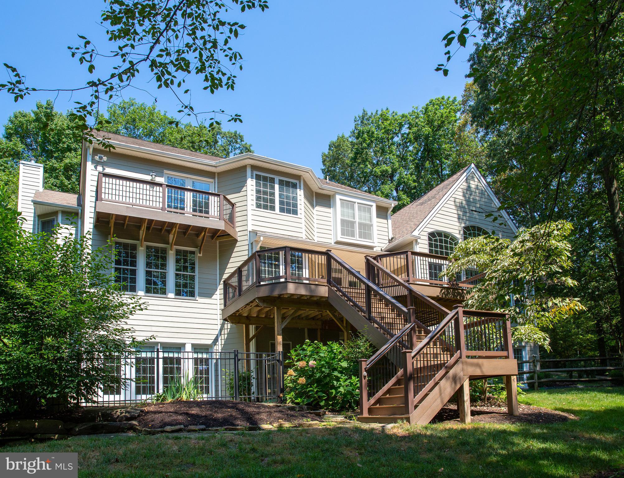 5708 Ridgeview Drive Doylestown, PA 18902 - Photo 32 of 37 Exterior Rear & expansive Deck w/5'wide stairs
