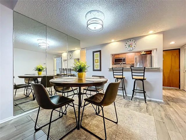 a view of a dining room with furniture