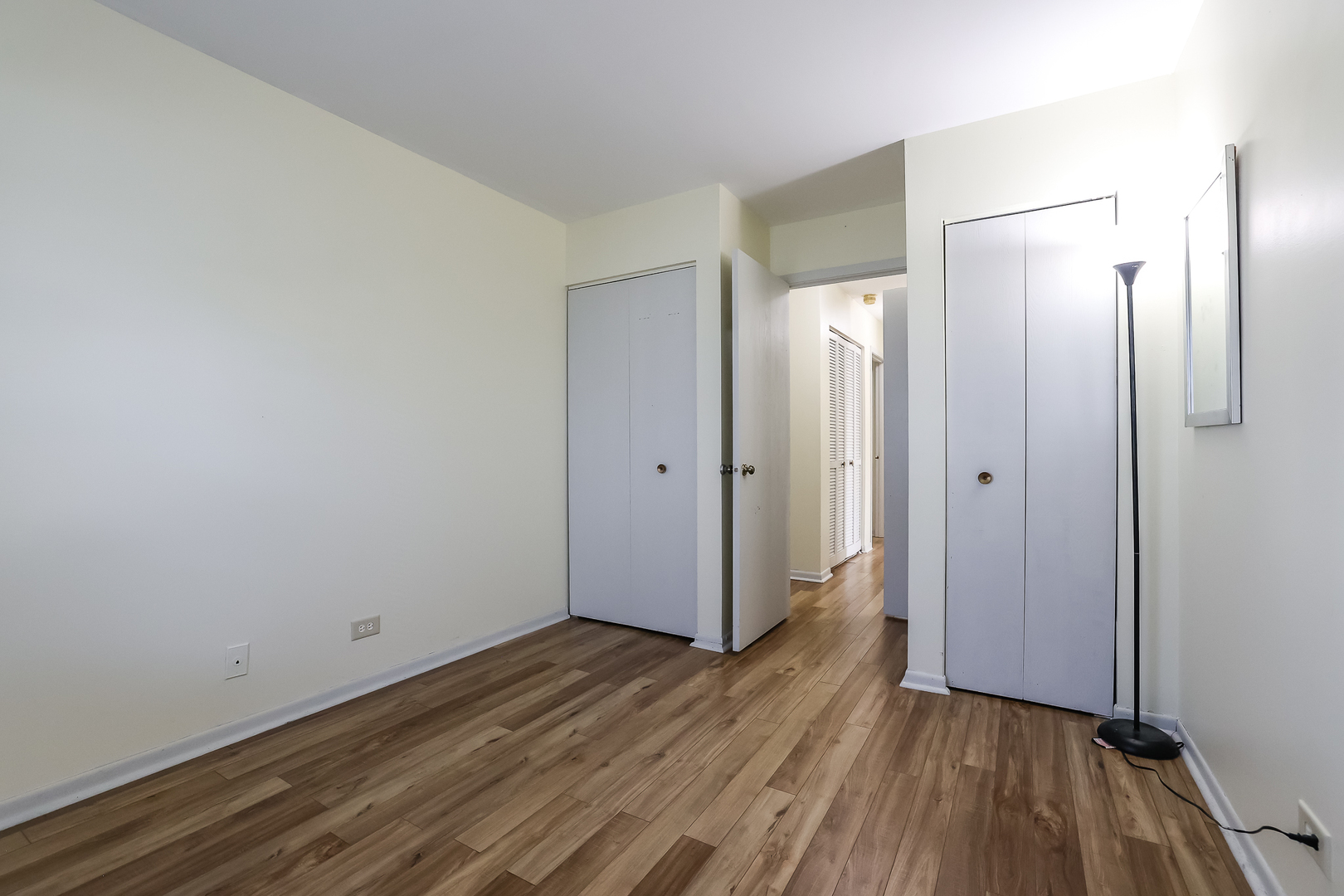 347 Juniper Circle Streamwood, IL 60107 - Photo 11 of 23 a view of hallway with wooden floor