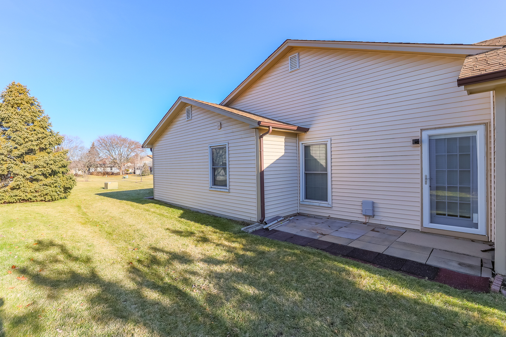 347 Juniper Circle Streamwood, IL 60107 - Photo 22 of 23 a view of house with backyard and garden