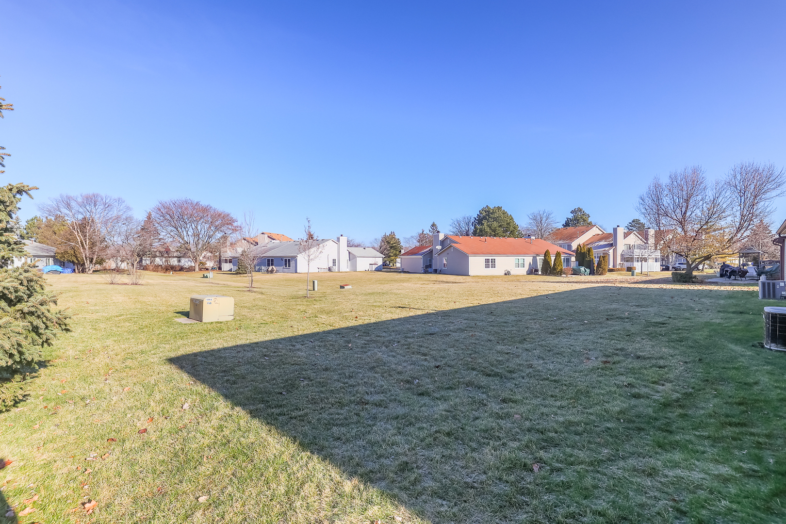 347 Juniper Circle Streamwood, IL 60107 - Photo 23 of 23 a view of a lake with houses