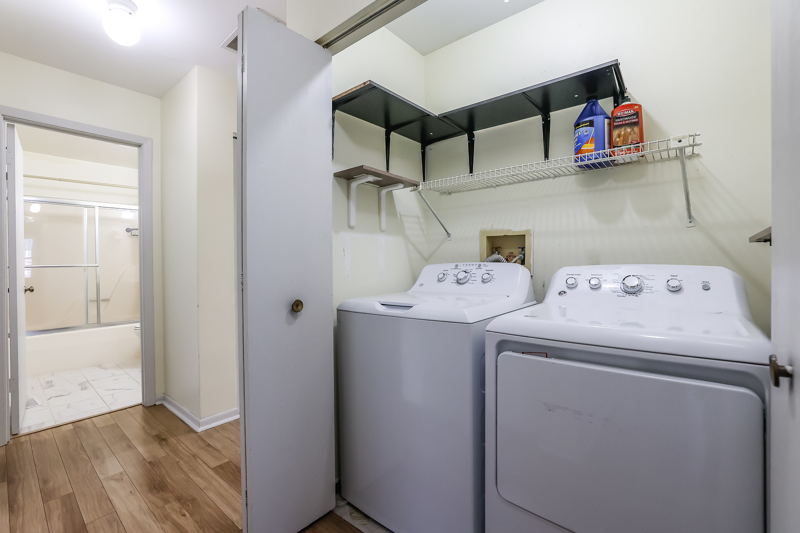 347 Juniper Circle Streamwood, IL 60107 - Photo 10 of 23 a utility room with dryer and washer