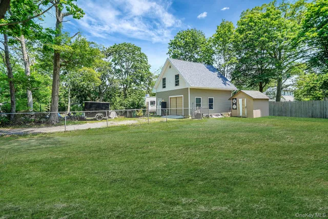 a house view with a garden space