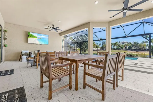 a view of a dining room with furniture window and outside view