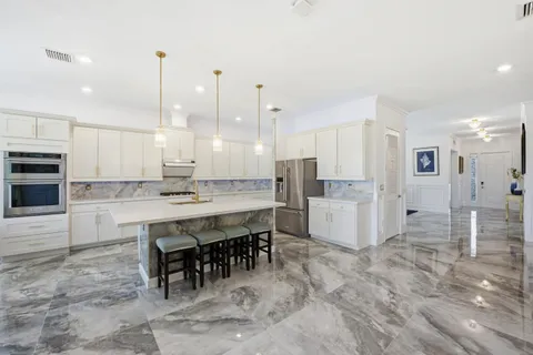 $980,000 | 984 Sterling Pine Place, Loxahatchee, FL 33470