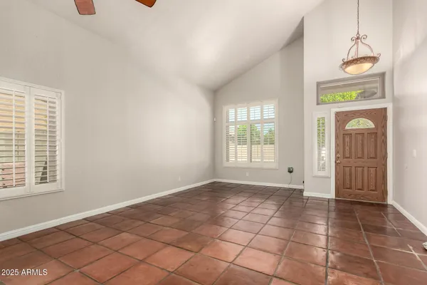 a view of an empty room and window