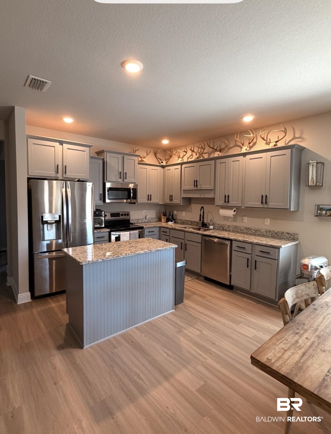 32215 Calder Court Daphne, AL 36527 - Photo 6 of 13 Kitchen featuring gray cabinets, stainless steel appliances, recessed lighting, and a textured ceiling