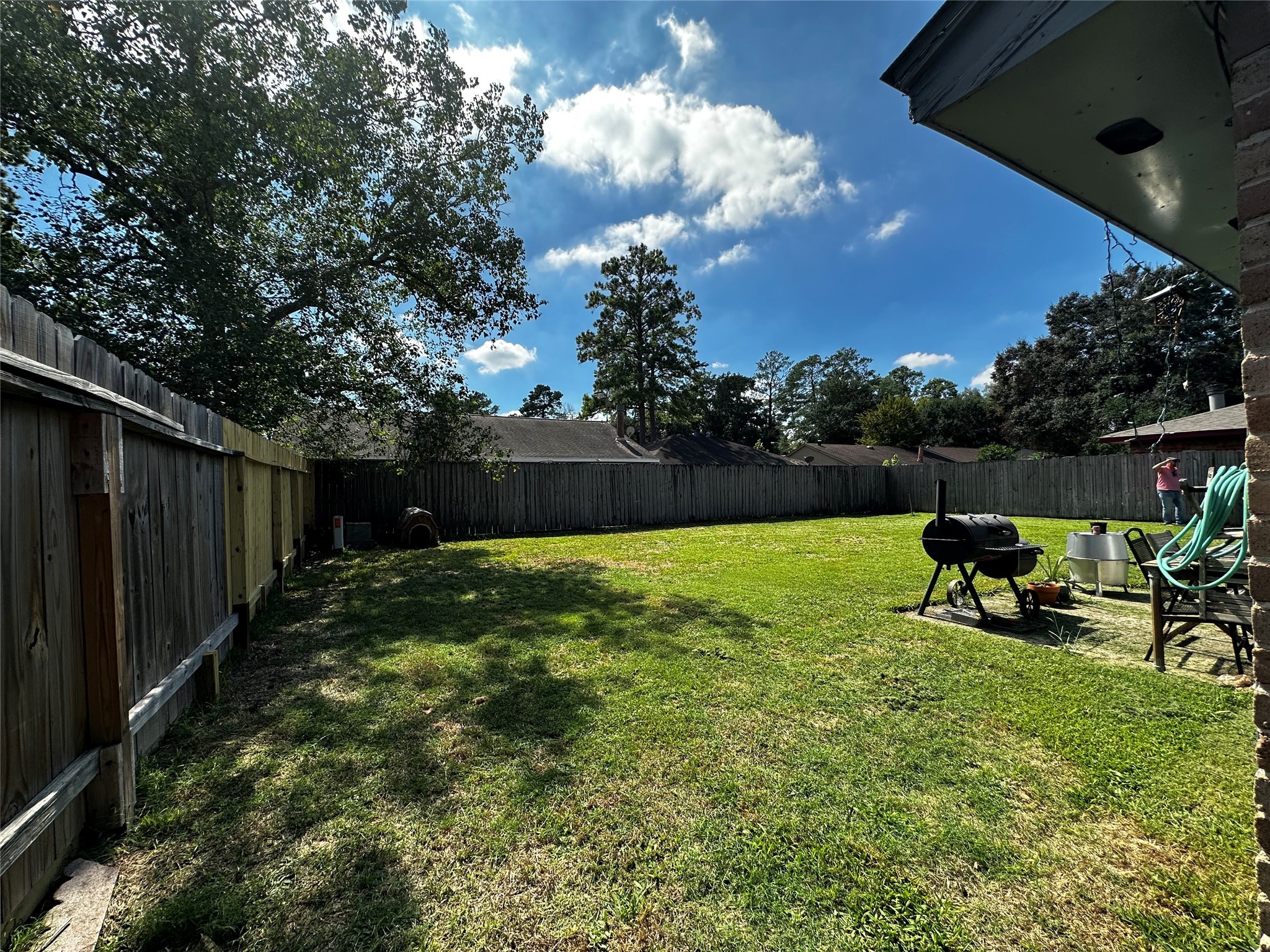 6222 Brookgate Drive Spring, TX 77373 - Photo 12 of 13 a view of backyard with seating space