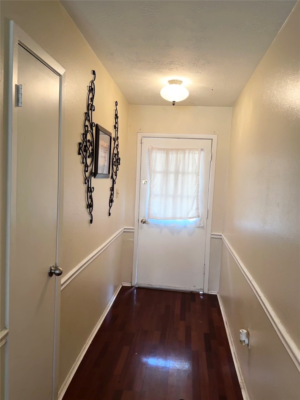 6222 Brookgate Drive Spring, TX 77373 - Photo 4 of 13 a view of an entryway with wooden floor