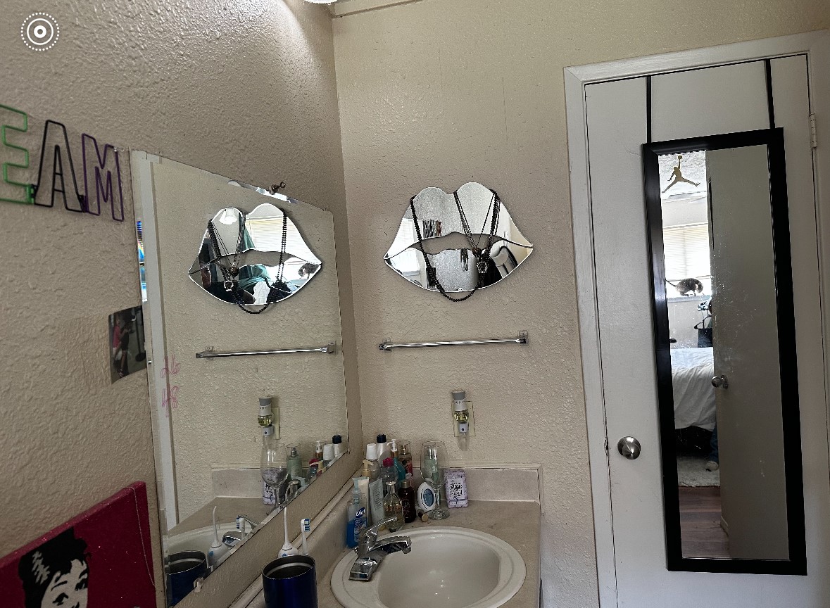 6222 Brookgate Drive Spring, TX 77373 - Photo 10 of 13 a bathroom with a sink mirror and vanity