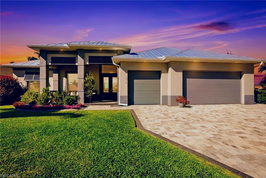 1616 Old Burnt Store Road North Cape Coral, FL 33993 - Photo 2 of 50 This home has a metal roof AND SOLAR PANELS.