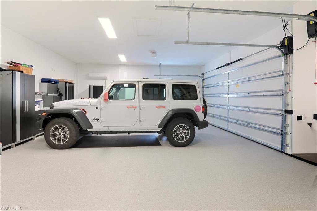 1616 Old Burnt Store Road North Cape Coral, FL 33993 - Photo 25 of 49 a view of a car garage
