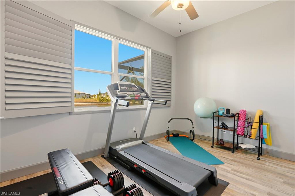 1616 Old Burnt Store Road North Cape Coral, FL 33993 - Photo 33 of 50 5th Bedroom or Workout area with light wood finished floors and ceiling fan