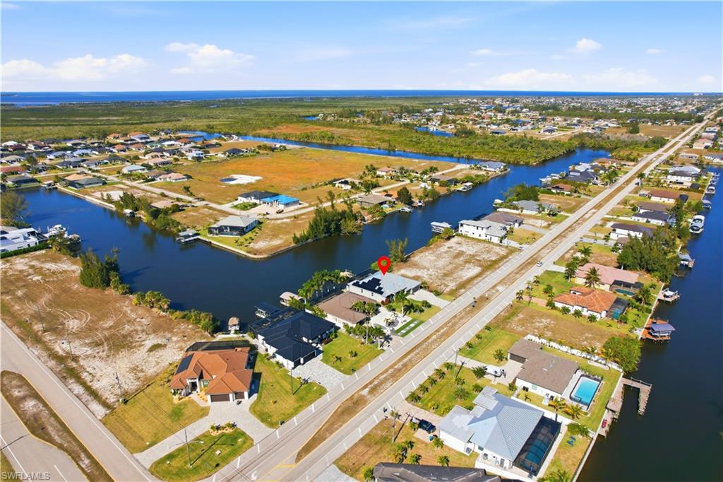1616 Old Burnt Store Road North Cape Coral, FL 33993 - Photo 6 of 50 Aerial view of property and surrounding area. If you were a bird, you could see Boca Grande from here.