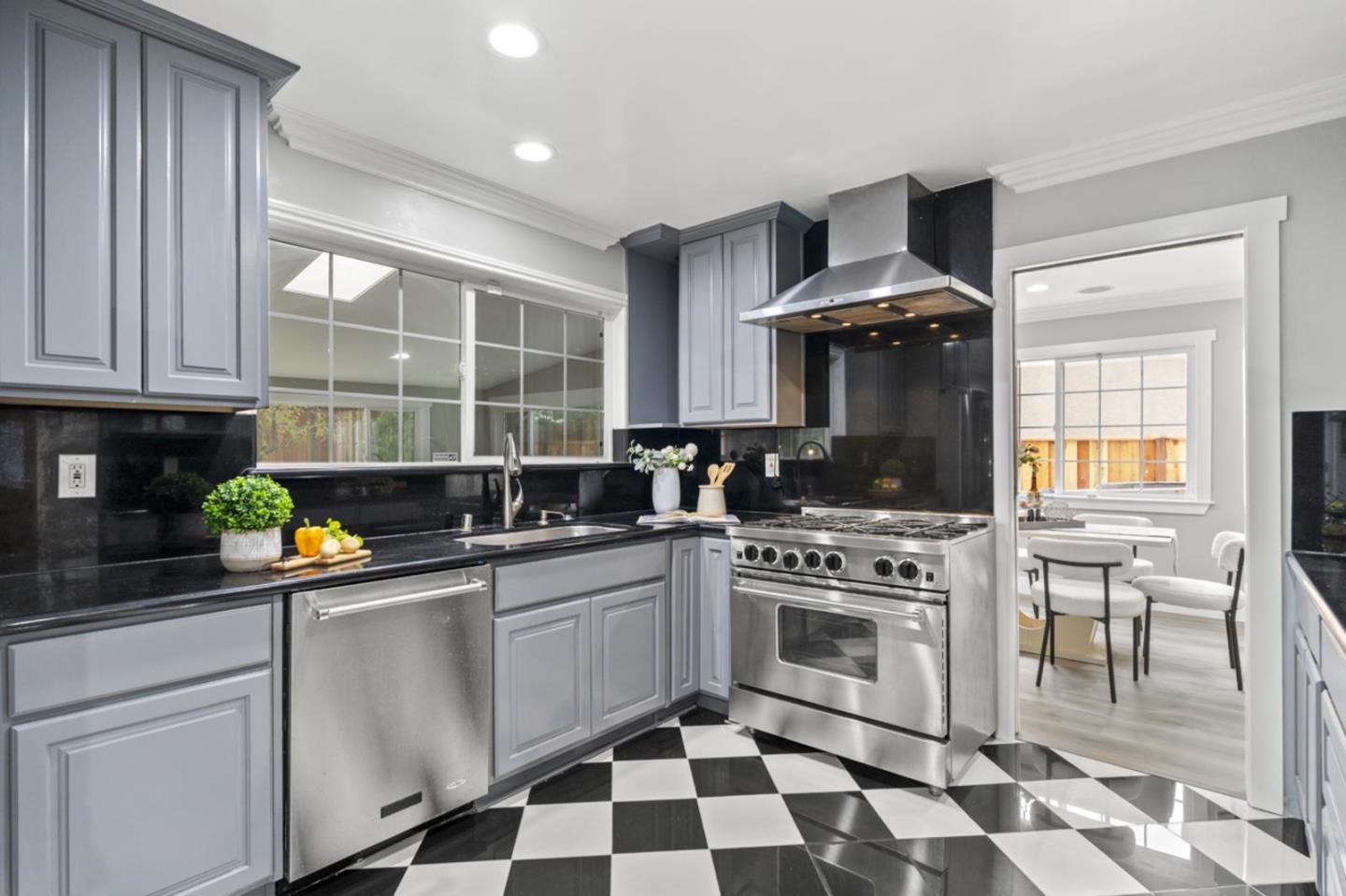 5150 Brookside Lane Concord, CA 94521 - Photo 14 of 51 a kitchen with a stove a sink and a microwave