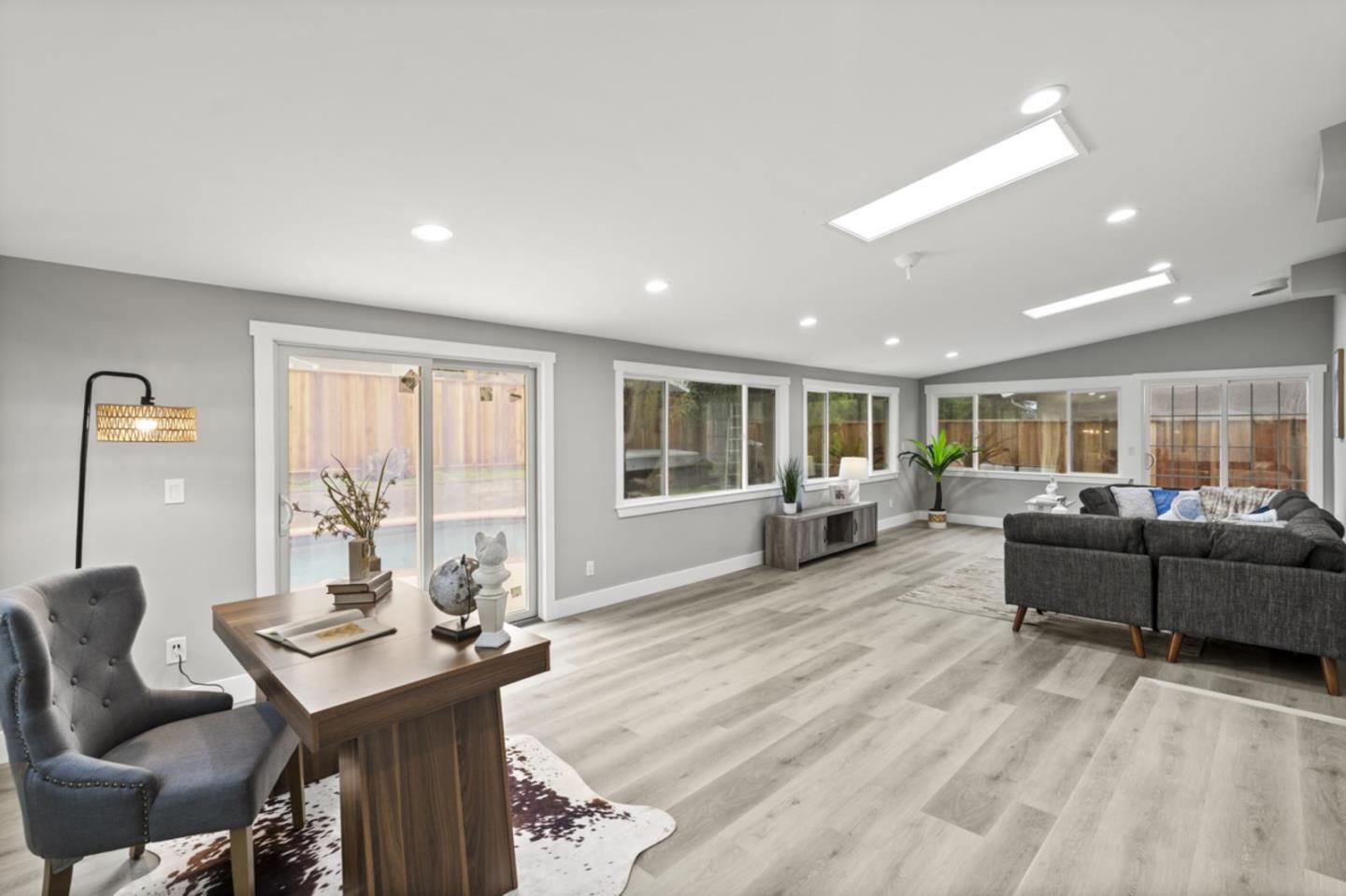 5150 Brookside Lane Concord, CA 94521 - Photo 18 of 51 a living room with furniture and a large window
