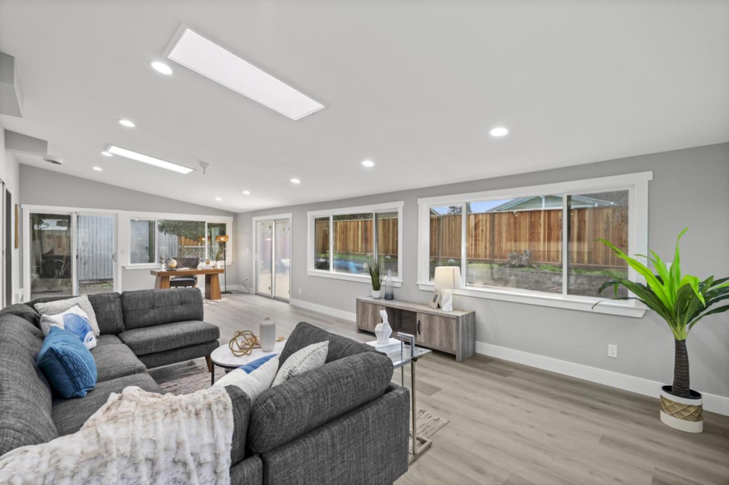 5150 Brookside Lane Concord, CA 94521 - Photo 21 of 51 a living room with furniture and a potted plant