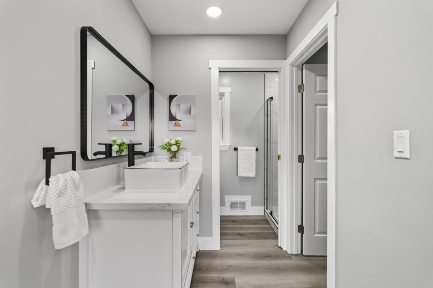 5150 Brookside Lane Concord, CA 94521 - Photo 34 of 51 a en suite bathroom with a sink mirror and shower