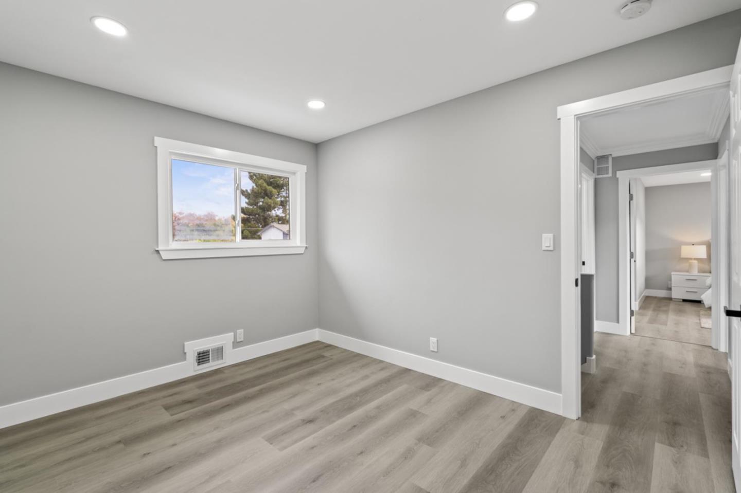 5150 Brookside Lane Concord, CA 94521 - Photo 43 of 51 a view of room with wooden floor and window
