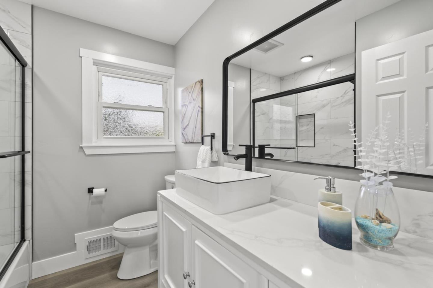 5150 Brookside Lane Concord, CA 94521 - Photo 46 of 51 a bathroom with a sink toilet and mirror