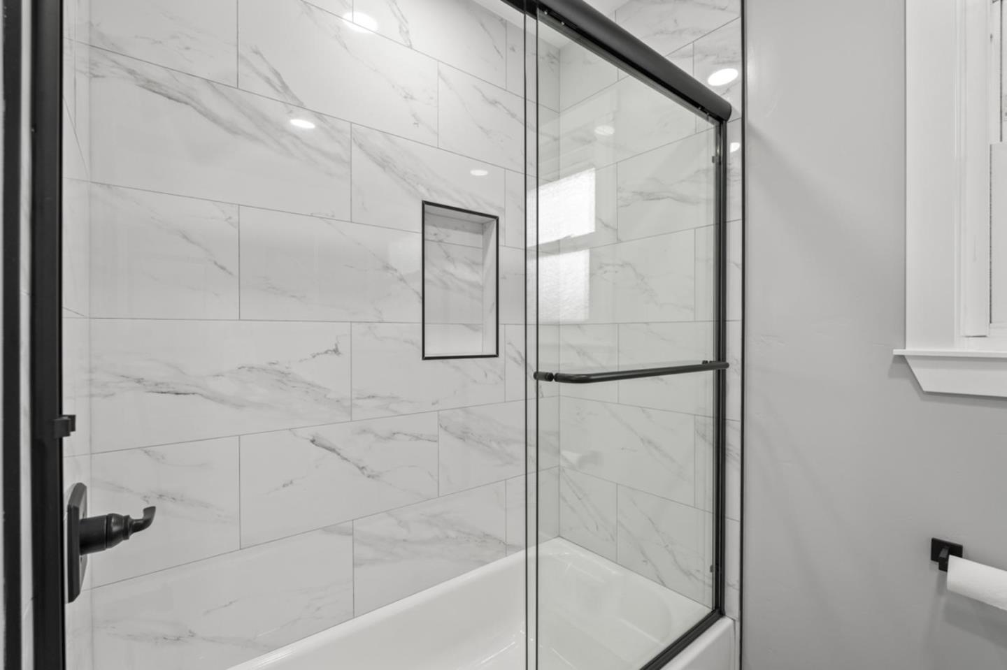 5150 Brookside Lane Concord, CA 94521 - Photo 48 of 51 a bathroom with a bathtub and a shower