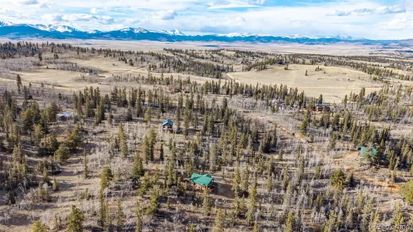 a view of mountains and valleys