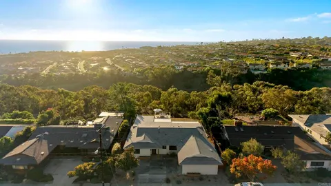 an aerial view of a residential houses