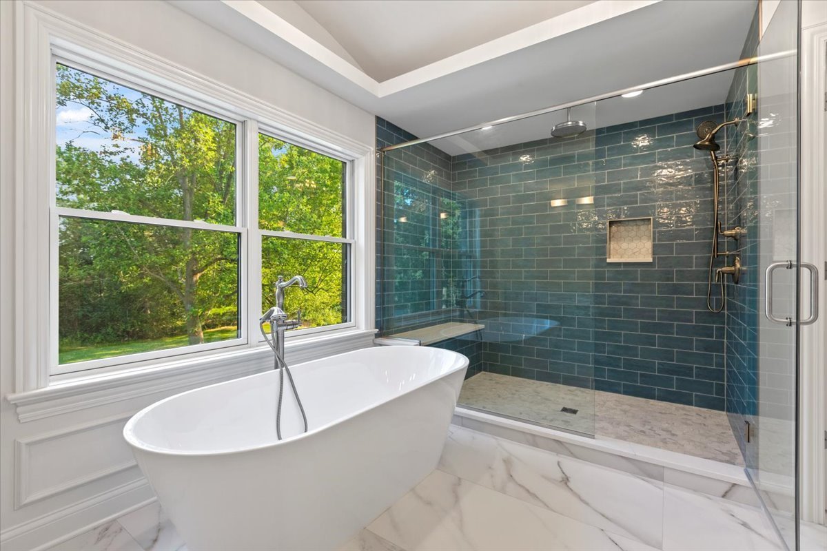 1 West Penny Road South Barrington, IL 60010 - Photo 21 of 30 a bathroom with a bathtub and a shower
