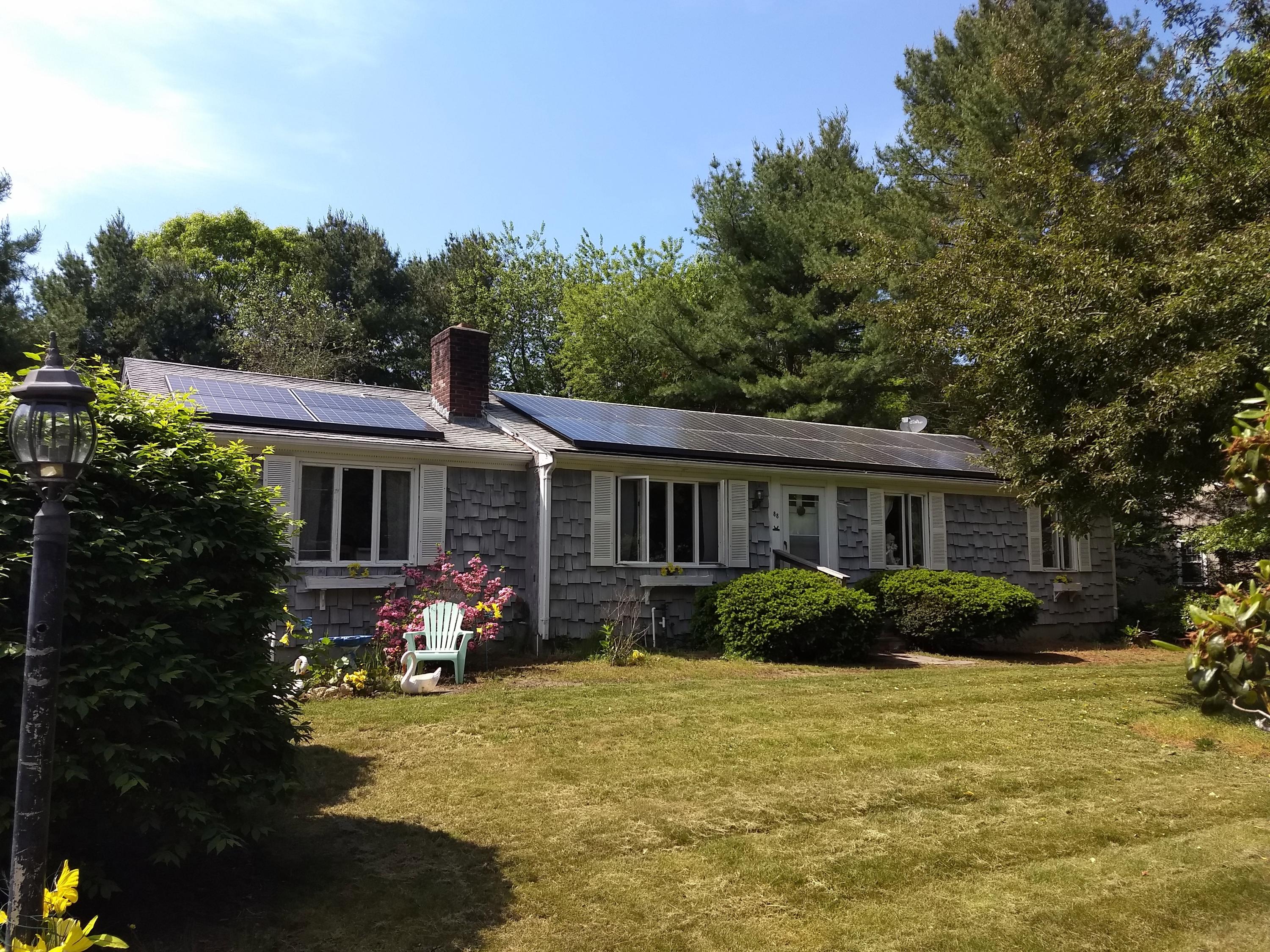 88 Cedric Road Centerville, MA 02632 - Photo 1 of 25 a front view of house with yard outdoor seating and green space