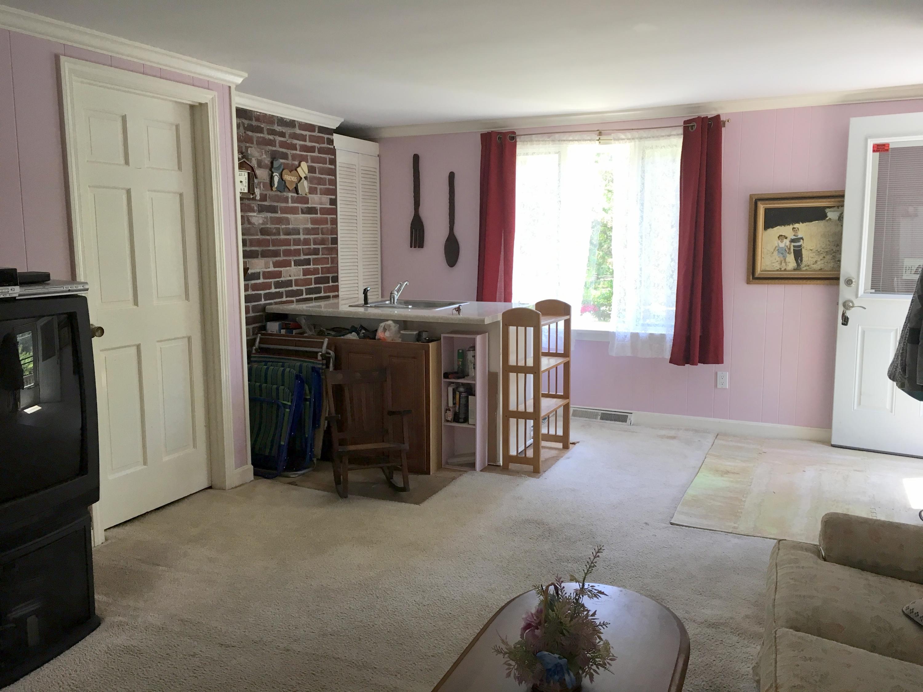 88 Cedric Road Centerville, MA 02632 - Photo 11 of 25 a view of a livingroom with furniture and window