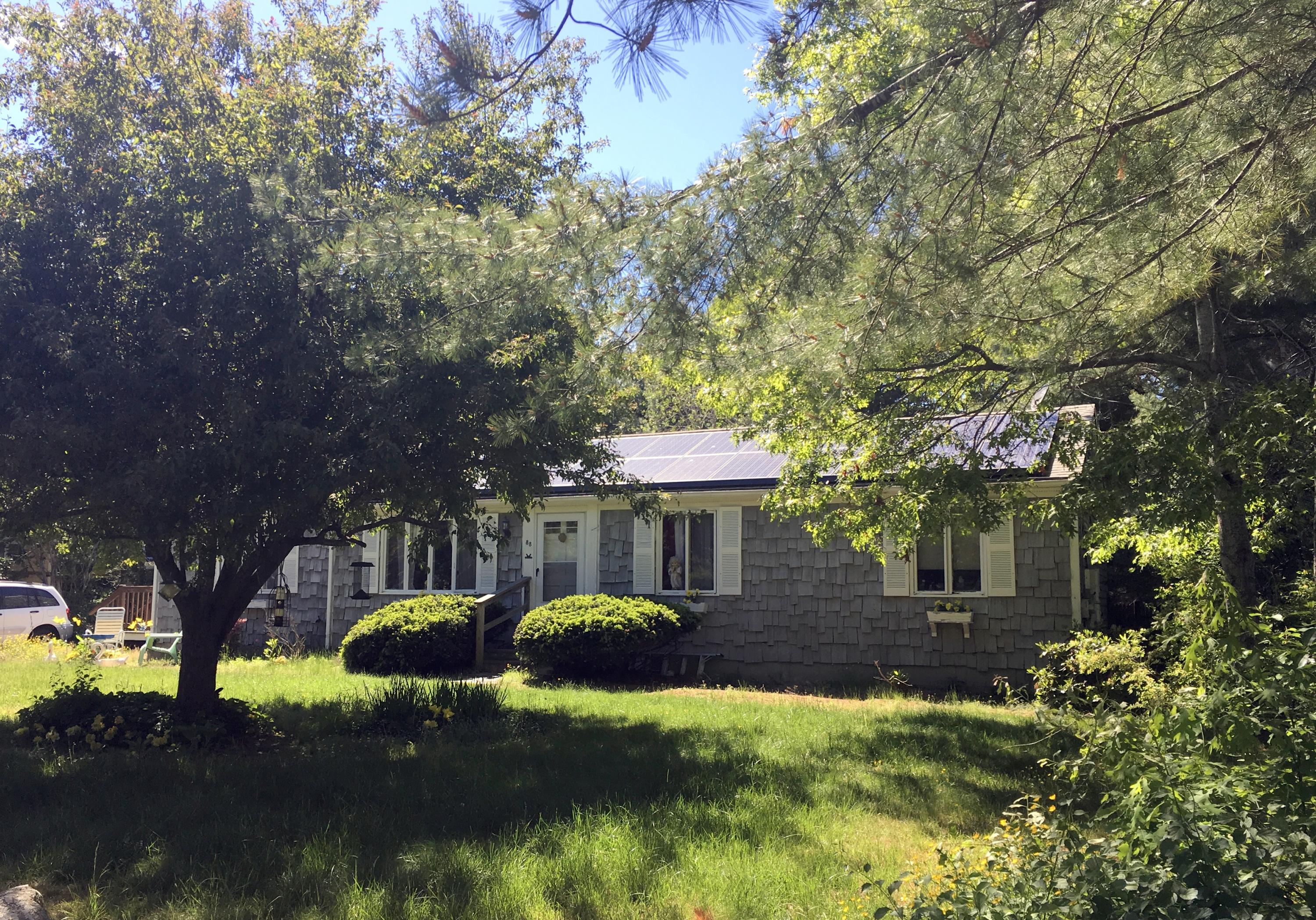 88 Cedric Road Centerville, MA 02632 - Photo 3 of 25 a view of a house with backyard and sitting area