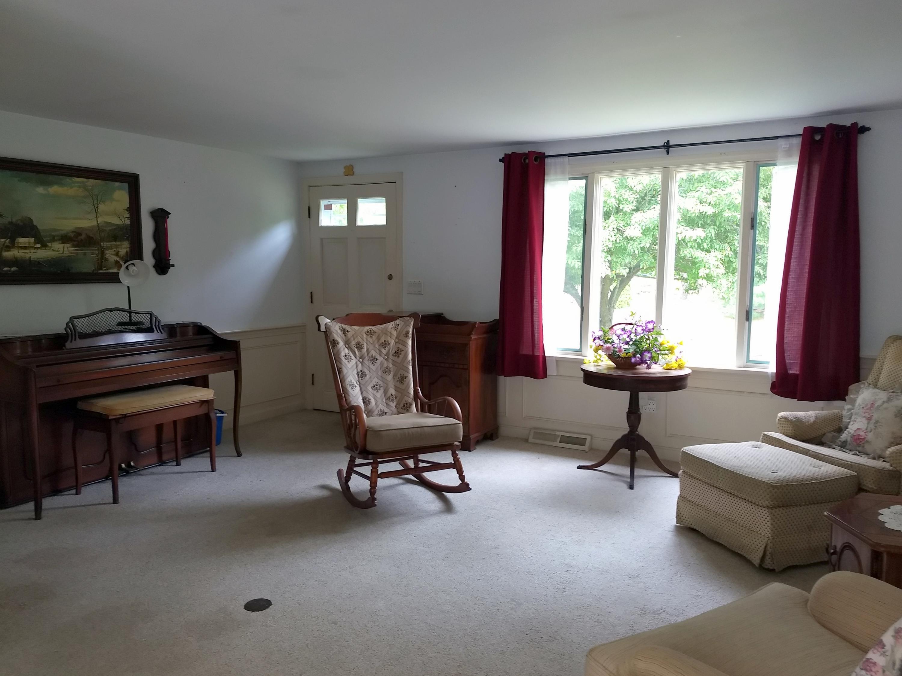 88 Cedric Road Centerville, MA 02632 - Photo 5 of 25 a living room with furniture and a flat screen tv