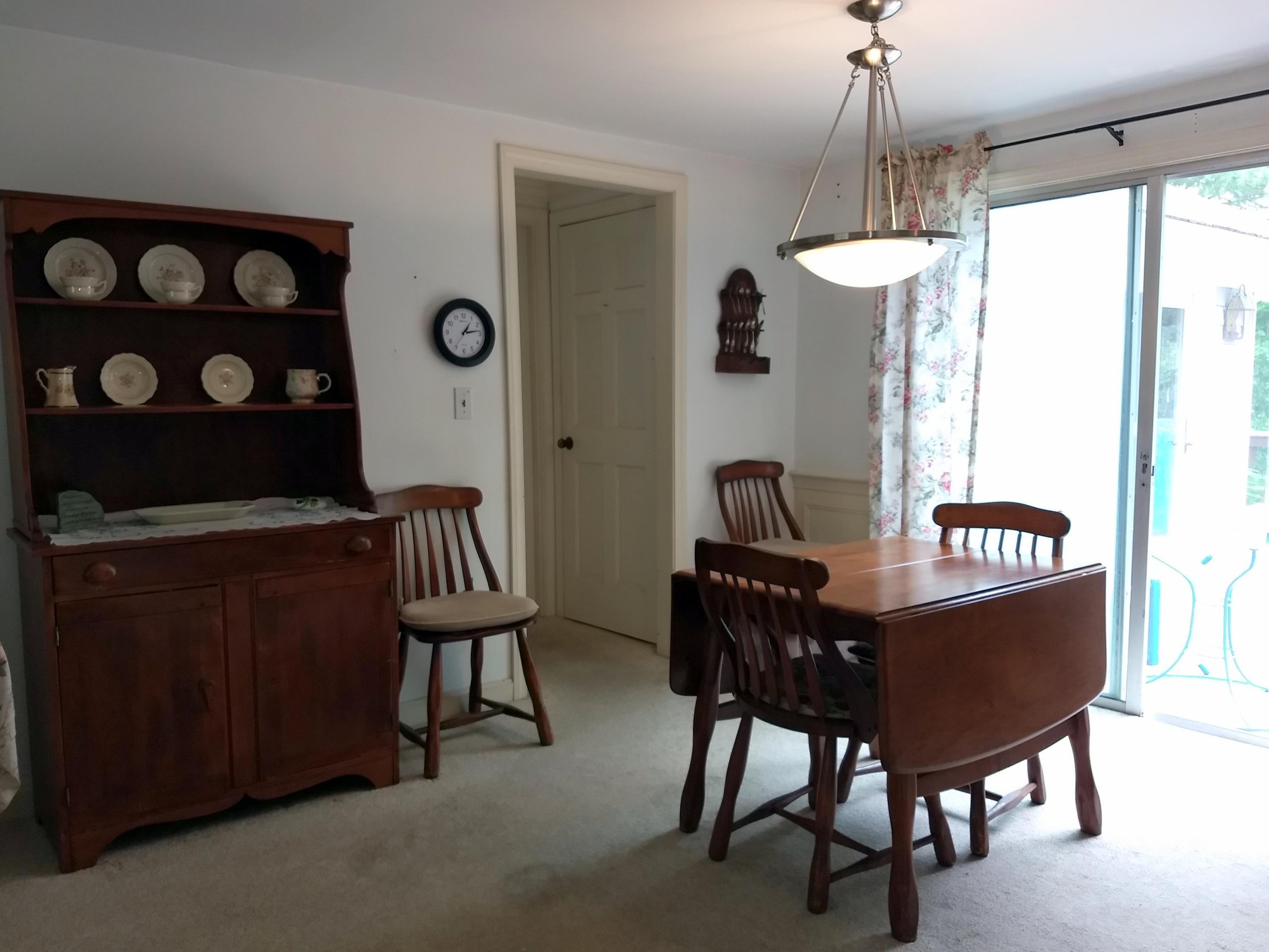88 Cedric Road Centerville, MA 02632 - Photo 9 of 25 a view of a dining room with furniture window and outside view