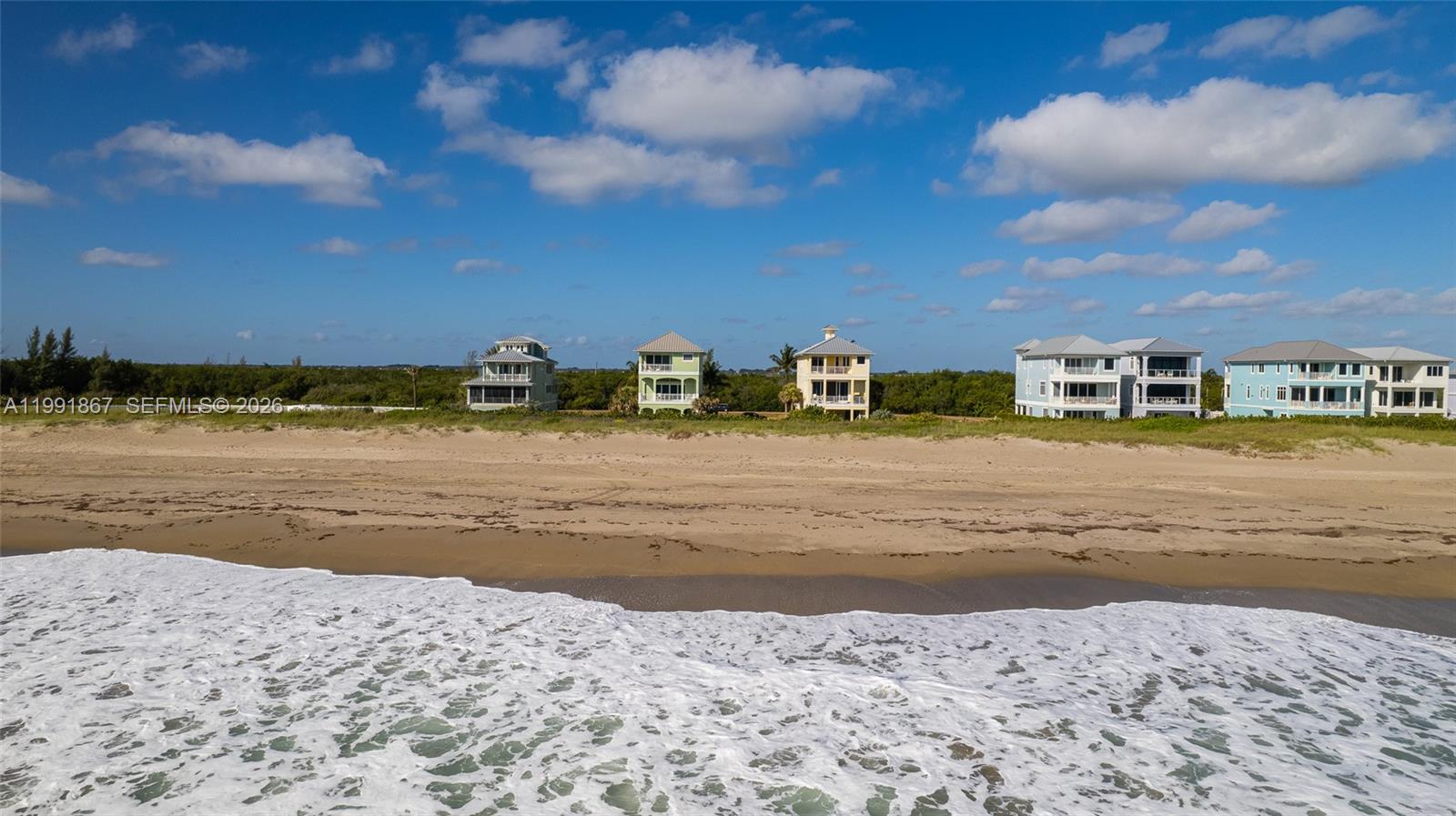 5028 Watersong Way Fort Pierce, FL 34949 - Photo 2 of 24 a view of a ocean with beach