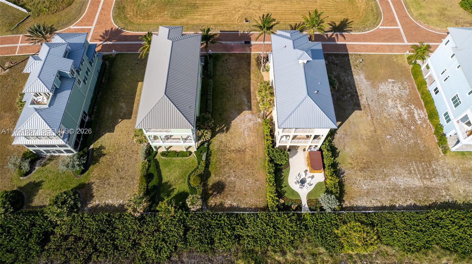 5028 Watersong Way Fort Pierce, FL 34949 - Photo 3 of 24 an aerial view of a house with outdoor space
