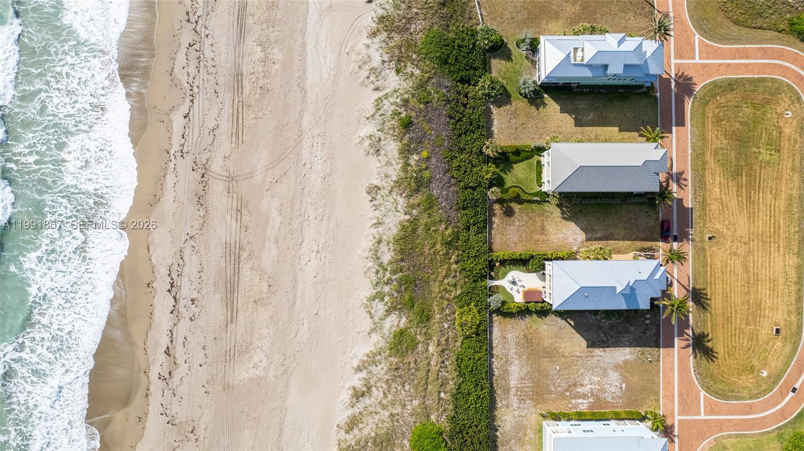 5028 Watersong Way Fort Pierce, FL 34949 - Photo 4 of 24 an aerial view of a house with a swimming pool