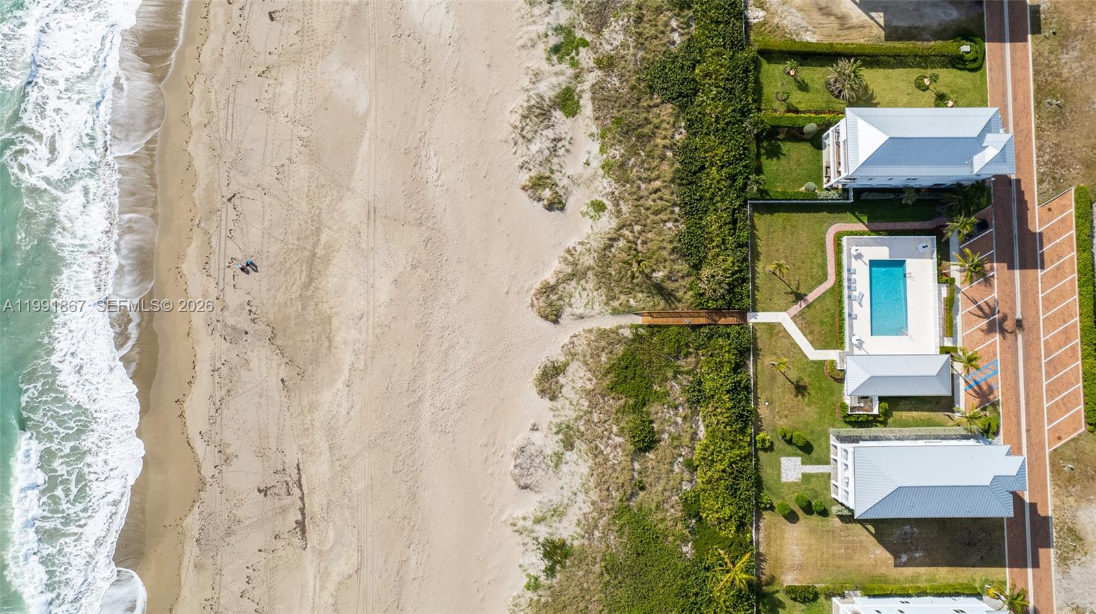 5028 Watersong Way Fort Pierce, FL 34949 - Photo 7 of 24 a house with a trees in front of it
