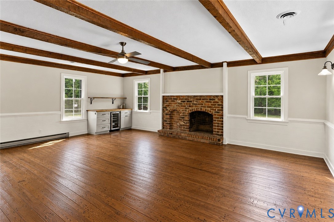 20010 River Road Chesterfield, VA 23838 - Photo 13 of 36 a view of empty room with wooden floor and fireplace