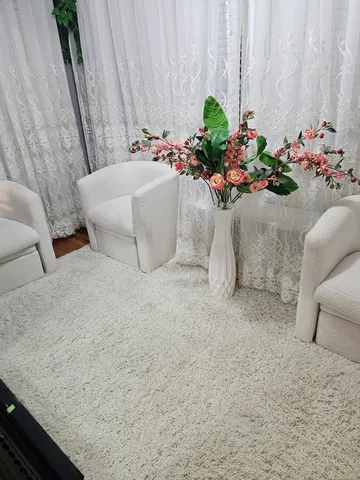 a white bath tub sitting in a bathroom
