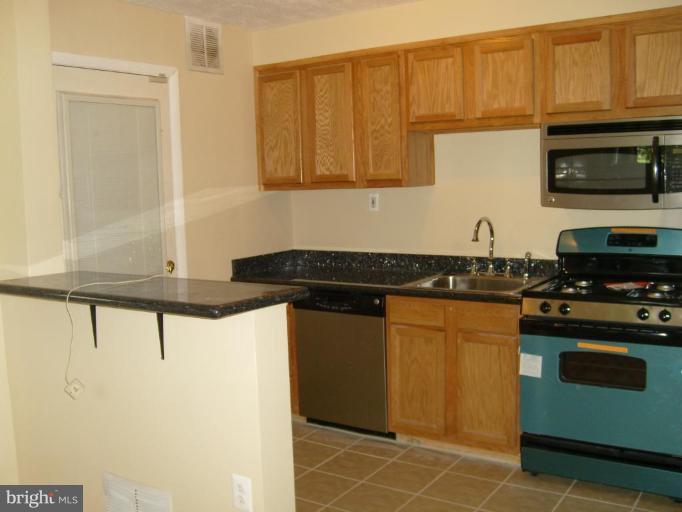 2700 Norfen Road Halethorpe, MD 21227 - Photo 7 of 14 New stainless steel appliances.