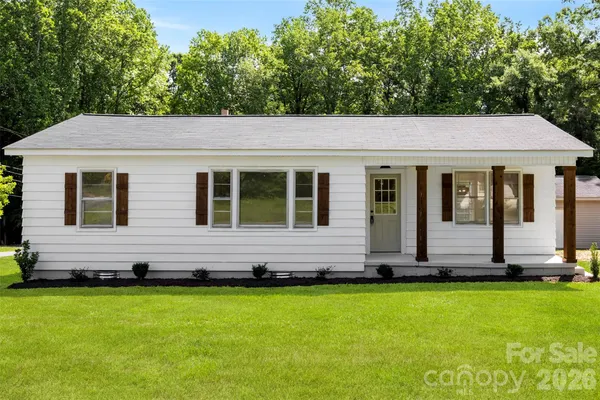 a front view of house with yard